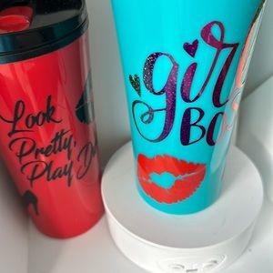 2 tumbler one is red look pretty play dirty. And the other one girl boss